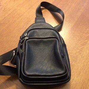 Vegan leather shoulder sling handbag.  Black.  EUC.
